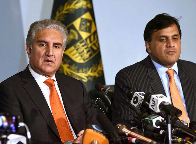 Foreign Minister Shah Mehmood Qureshi and FO spokesperson Dr Muhammad Faisal. PHOTO: APP
