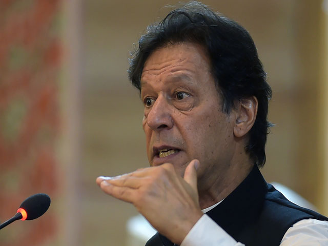 Prime Minister Imran Khan addresses the legislative assembly in Muzaffarabad on August 14, 2019. PHOTO: AFP