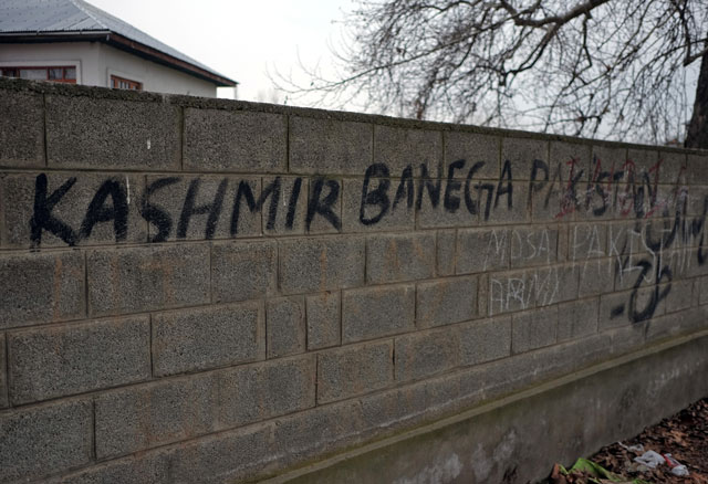 Graffiti on a wall reading "Kashmir will become Pakistan" is pictured in Pinglan village in occupied Kashmir's Pulwama district March 23, 2019. PHOTO: REUTERS