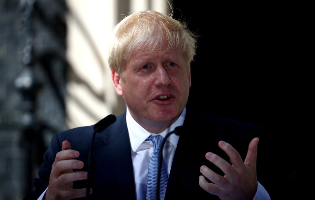 The prime minister called for parliament to vote in favour of holding an early election on October 15. PHOTO: REUTERS
