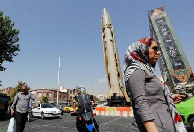 A Shahab-3 surface-to-surface missile is on display in a Tehran street exhibition by Iran's Revolutionary Guards in September 2019 marking the anniversary of the Iran-Iraq War. PHOTO: AFP