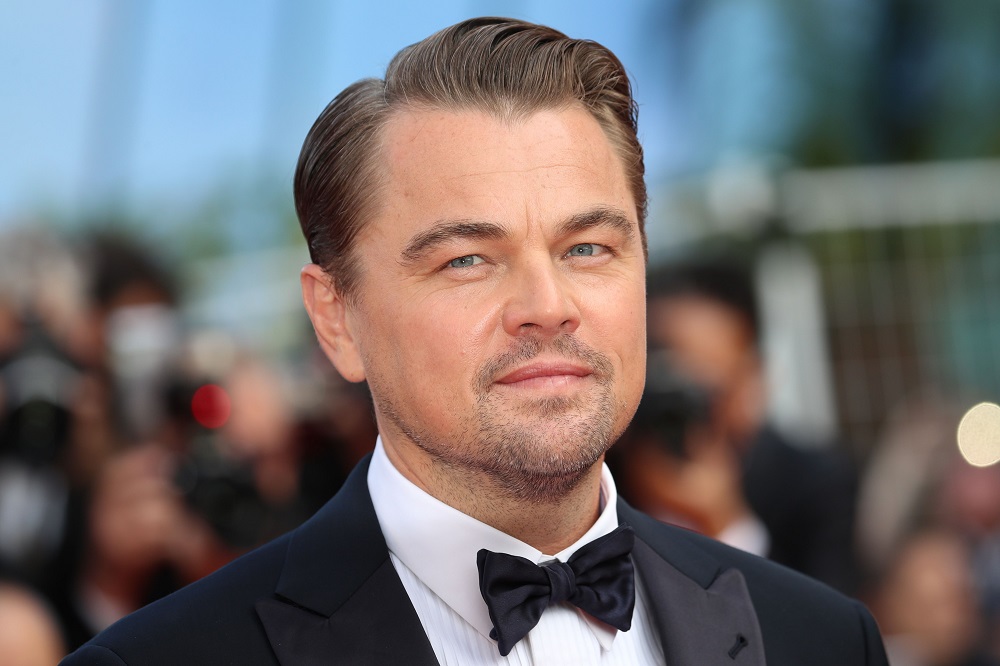 US actor Leonardo DiCaprio poses as he arrives for the screening of the film "Once Upon a Time... in Hollywood" at the 72nd edition of the Cannes Film Festival in Cannes, southern France, on May 21, 2019. (Photo by Valery HACHE / AFP)