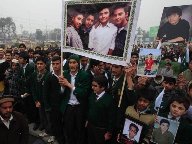 APS Students in a Solidarity rally for their fellow classmates who were victims of a gruesome attack. PHOTO: REUTERS