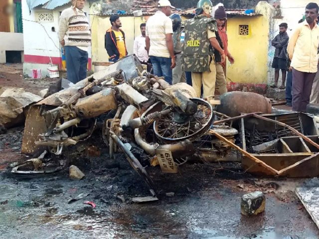 Nearly two dozen homes and as many vehicles were torched in riots. PHOTO COURTESY: TIMES OF INDIA