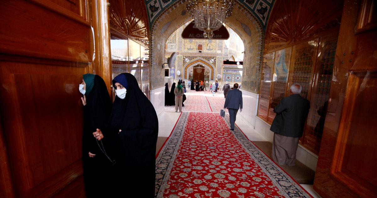 Iraqi female pilgrims wearing protective face mask at Imam Ali Shrine. PHOTO: REUTERS