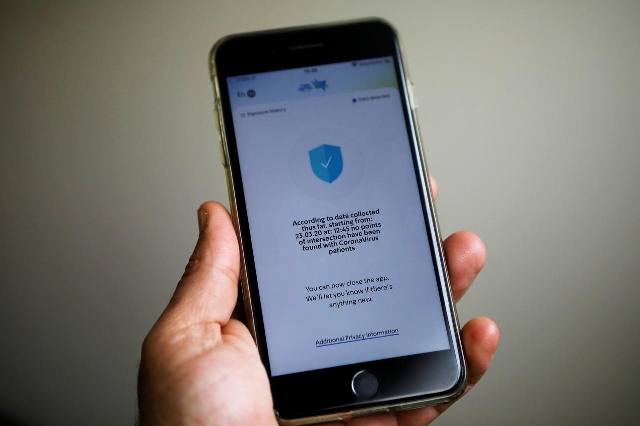 A mobile phone with HaMagen application on it is seen in this picture illustration taken on April 1, 2020. PHOTO: REUTERS