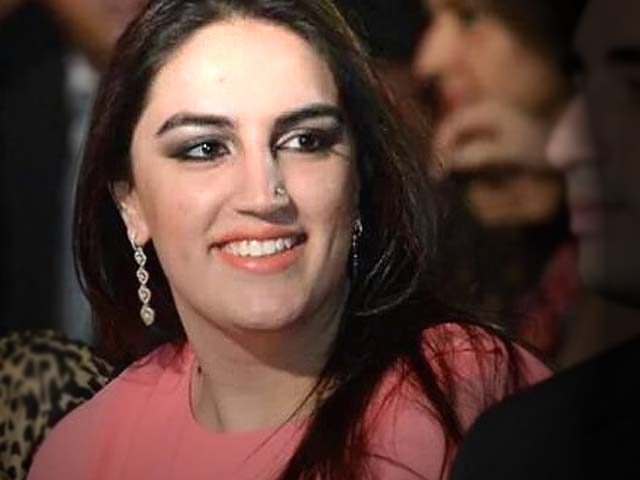 Bilawal Bhutto Zardari, Chairman of the Pakistan Peoples Party, and his sister Bakhtawar watch a fashion show. PHOTO: GETTY