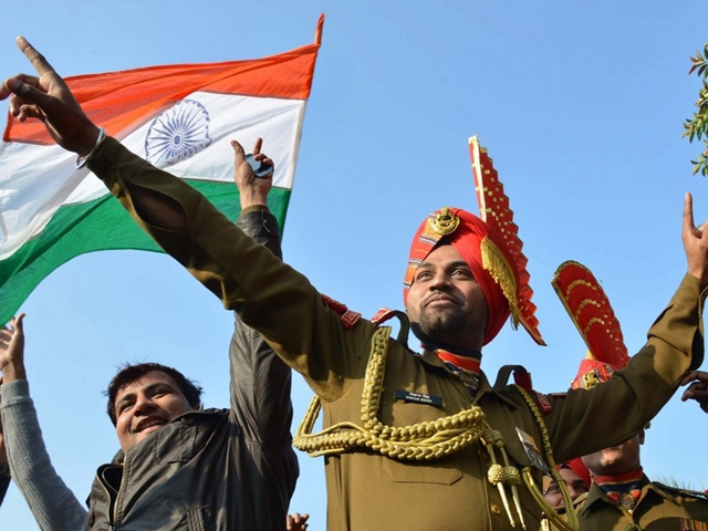 Indian Border Security Force personnel dance as they celebrate Republic Day at the India-Pakistan Wagah border post. PHOTO: AFP