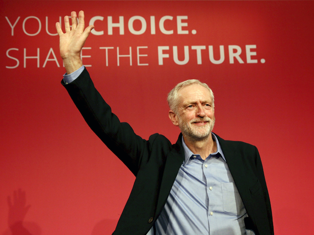 The new leader of Britain's opposition Labour Party Jeremy Corbyn waves after making his inaugural speech at the Queen Elizabeth Centre in central London, September 12, 2015. PHOTO: REUTERS