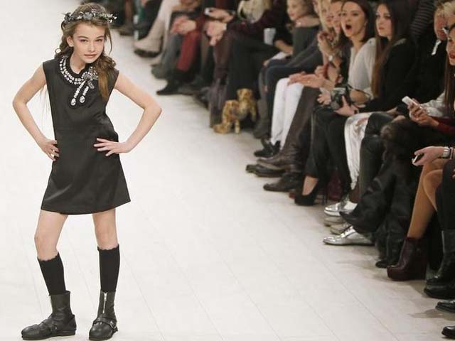 A model presents a creation by Ukrainian designer Viktor Anisimov during Ukrainian Fashion Week in Kiev. PHOTO: REUTERS
