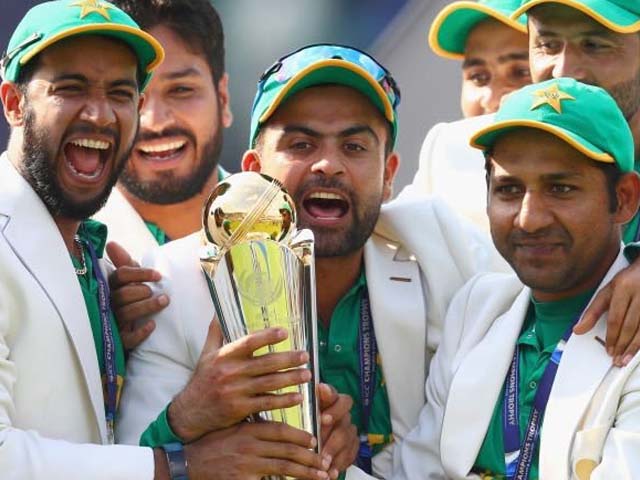LONDON, ENGLAND - JUNE 18: Sarfraz Ahmed of Pakistan lifts the winners trophy as Pakistan win the ICC Champions trophy cricket match between India and Pakistan at The Oval in London on June 18, 2017. PHOTO: GETTY