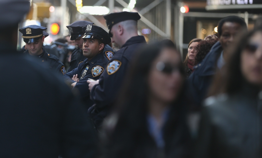 The Boston Globe said a department store surveillance camera and private photographer may have caught a suspect planting one of the two bombs. PHOTO: AFP