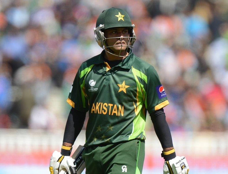 Mohammad Hafeez leaves the field after being dismissed during their ICC Champions Trophy group B match against India at Edgbaston cricket ground, Birmingham June 15, 2013. PHOTO: REUTERS