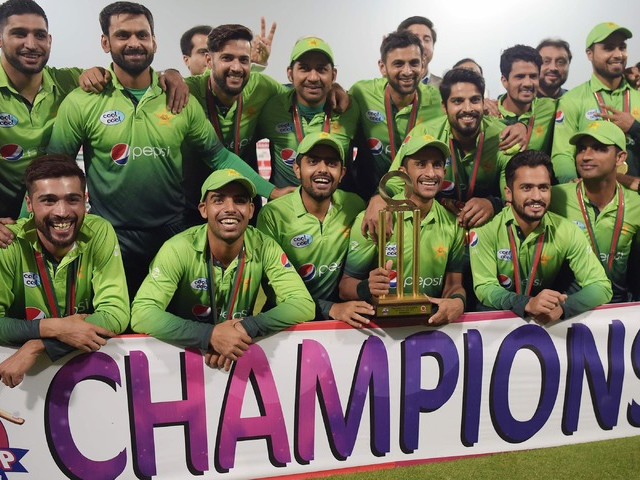 The Pakistan team poses with the trophy after winning the T20 series against Sri Lanka in Lahore. PHOTO: AFP