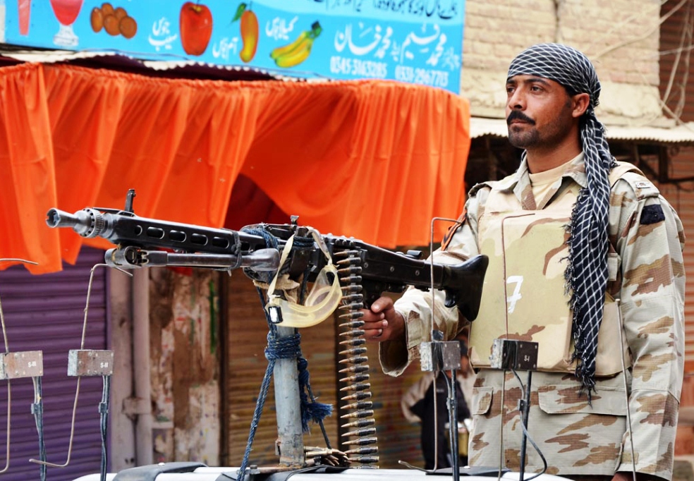 A security officer on duty in Larkana. PHOTO: ONLINE