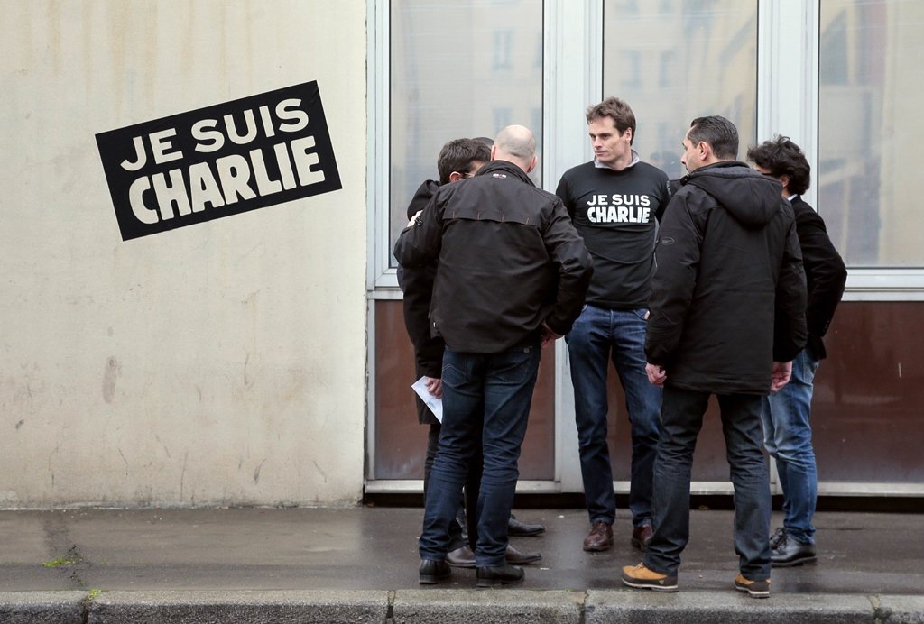 The surviving staff members were met by Liberation's bosses and shown to an area donated to them to work on the issue. PHOTO: AFP
