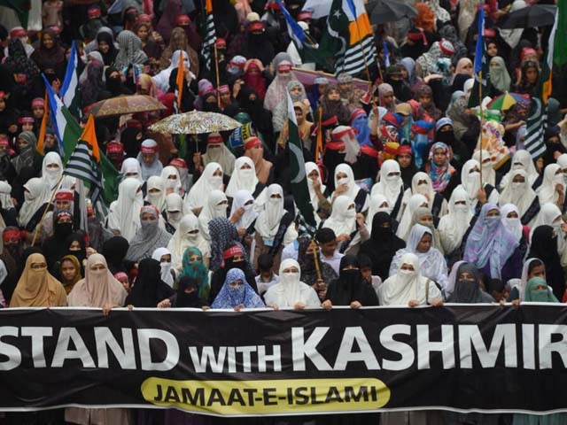 Activists of Jamaat-e-Islami Pakistan march in a protest against the Indian decision to strip the disputed Kashmir region of its special autonomy. PHOTO: AFP