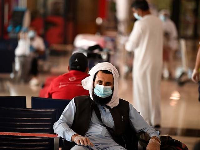 A Pakistani national waits at the Dubai International Airport. PHOTO: AFP